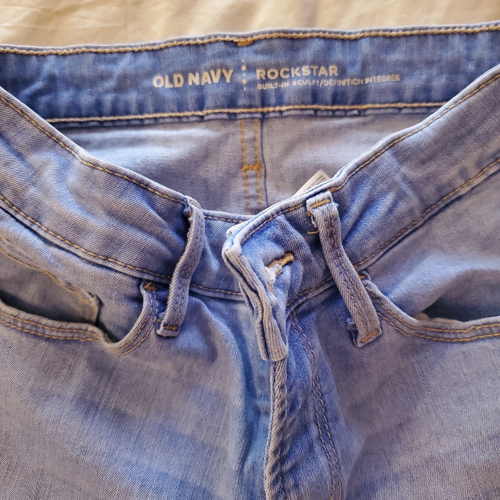 Light blue skinny jeans frayed bottom
